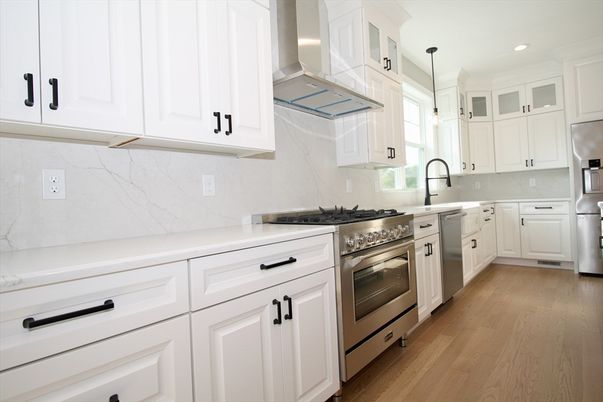 Interior, Kitchen, Marble Walls, Pendant Lights, Recessed Lighting, Stainless Steel Appliances, Wood Texture Flooring