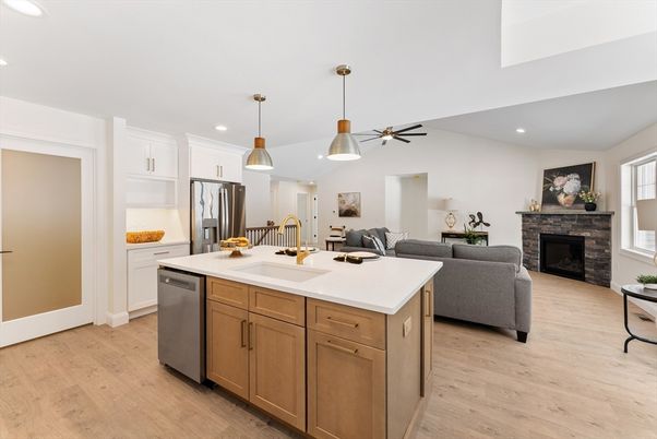 Fireplace, Interior, Kitchen, Living room, Pendant Lights, Recessed Lighting, Stainless Steel Appliances, Wood Texture Flooring