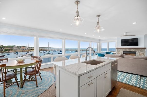 Dining room, Fireplace, Interior, Kitchen, Living room, Pendant Lights, Recessed Lighting, Water, Wood Texture Flooring