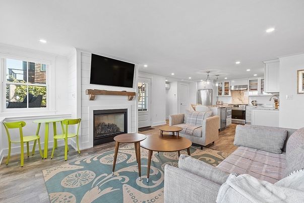 Fireplace, Interior, Kitchen, Living room, Pendant Lights, Recessed Lighting, Stainless Steel Appliances, Wood Texture Flooring