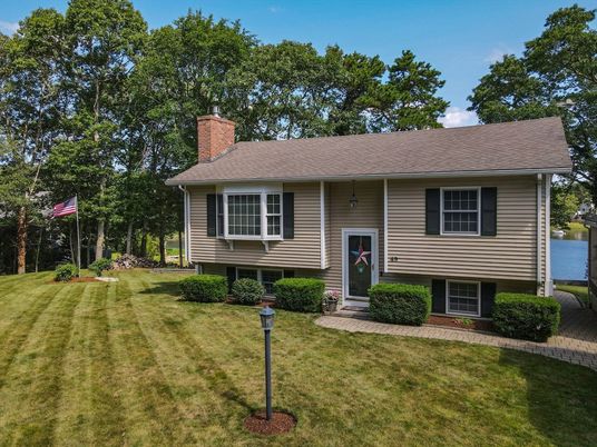 Backyard, Exterior, Facade, Water, Raised Ranch