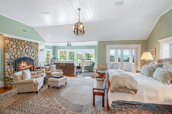 Bedroom, Fireplace, Interior, Living room, Pendant Lights, Stone Walls, Wood Texture Flooring