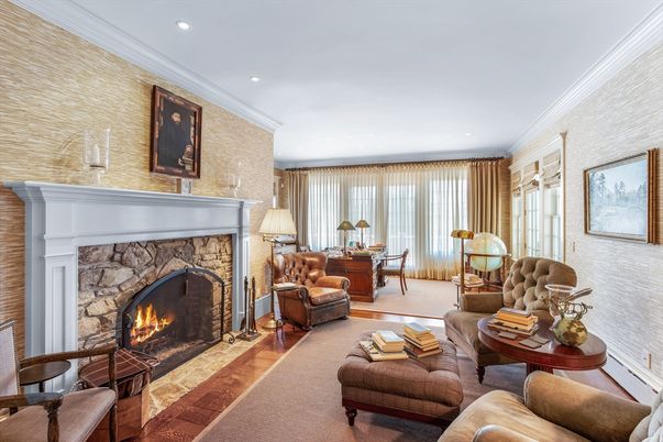 Dining room, Fireplace, Interior, Living room, Recessed Lighting, Stone Walls, Wood Texture Flooring