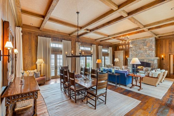 Dining room, Fireplace, Interior, Living room, Pendant Lights, Recessed Lighting, Stone Walls, Wooden Beams, Wood Texture Flooring