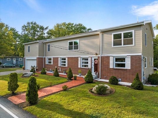 Exterior, Facade, Brick Facade, Raised Ranch