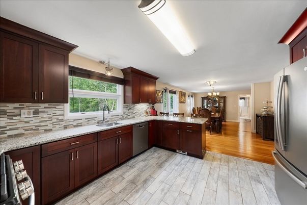 Chandelier, Dining room, Interior, Kitchen, Stainless Steel Appliances, Wood Texture Flooring