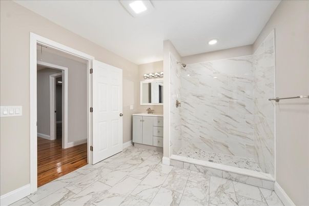 Bathroom, Glass Shower, Interior, Marble, Marble Walls, Recessed Lighting, Wood Texture Flooring