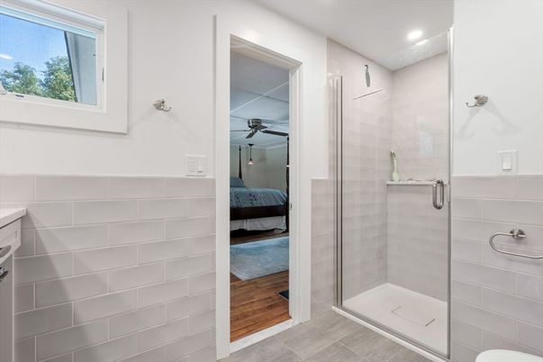 Bathroom, Bedroom, Glass Shower, Interior, Recessed Lighting, Wood Texture Flooring
