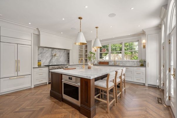 Interior, Kitchen, Marble Walls, Pendant Lights, Recessed Lighting, Stainless Steel Appliances, Wood Texture Flooring