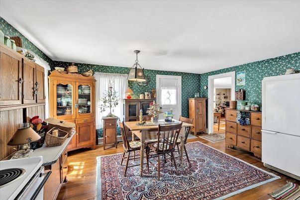 Dining room, Fireplace, Interior, Pendant Lights, Wood Texture Flooring