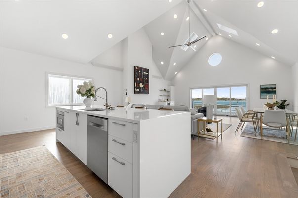 Dining room, Interior, Kitchen, Living room, Recessed Lighting, Water, Wood Texture Flooring