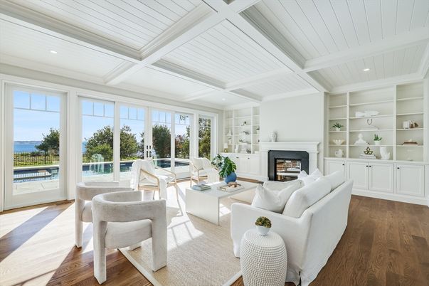 Fireplace, Interior, Living room, Recessed Lighting, Water, Wood Texture Flooring