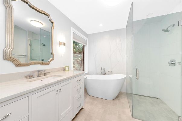 Bathroom, Dual Sink Vanities, Free Standing Baths, Glass Shower, Interior, Marble Walls, Recessed Lighting