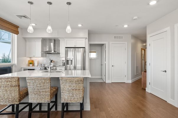 Interior, Kitchen, Pendant Lights, Recessed Lighting, Stainless Steel Appliances, Wood Texture Flooring
