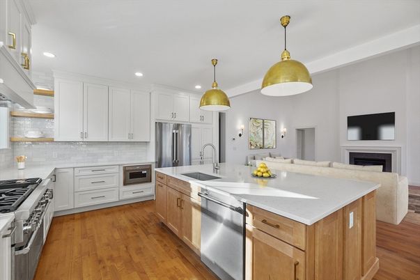 Fireplace, Interior, Kitchen, Pendant Lights, Recessed Lighting, Stainless Steel Appliances, Wood Texture Flooring