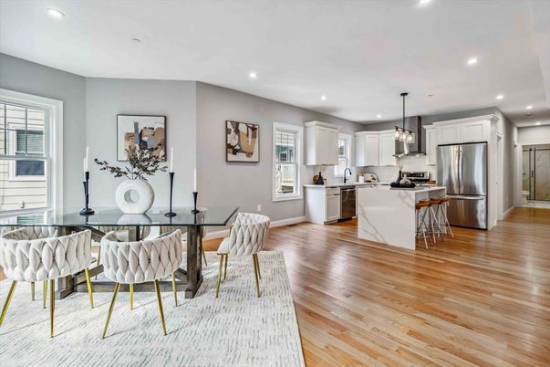 Dining room, Interior, Kitchen, Pendant Lights, Recessed Lighting, Stainless Steel Appliances, Wood Texture Flooring