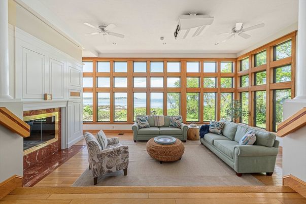 Fireplace, Interior, Living room, Sun Room, Water, Wood Texture Flooring