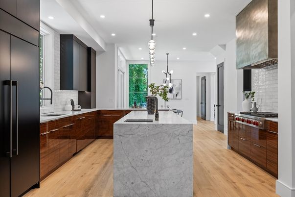 Interior, Kitchen, Marble Walls, Pendant Lights, Recessed Lighting, Stainless Steel Appliances, Wood Texture Flooring