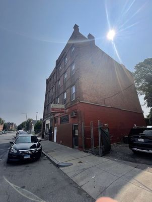 Exterior, Facade, Brick Facade, Condo Building