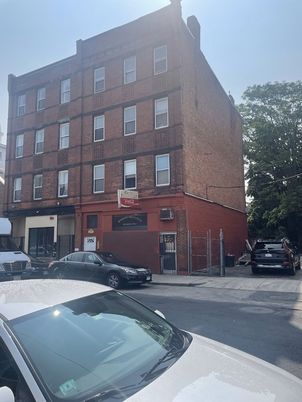 Exterior, Facade, Brick Facade, Condo Building