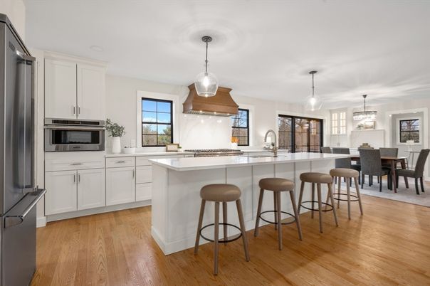 Dining room, Interior, Kitchen, Pendant Lights, Stainless Steel Appliances, Wood Texture Flooring