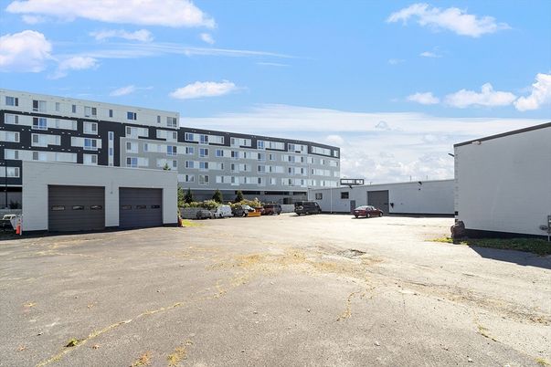 Attached, Exterior, Facade, Condo Building
