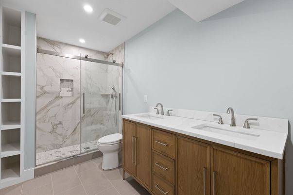 Bathroom, Dual Sink Vanities, Glass Shower, Interior, Marble Walls, Recessed Lighting