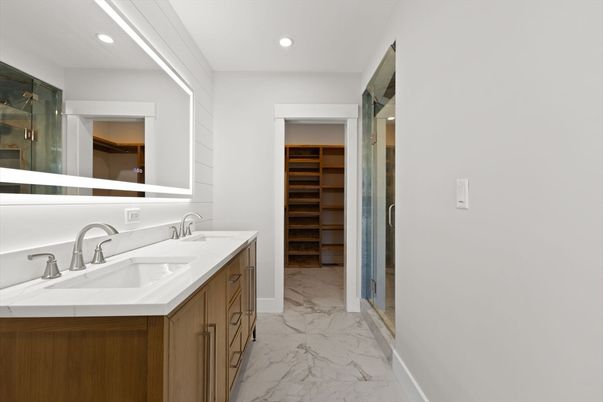 Bathroom, Dual Sink Vanities, Glass Shower, Interior, Marble, Recessed Lighting