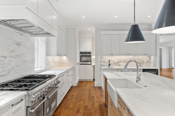 Interior, Kitchen, Marble Walls, Pendant Lights, Recessed Lighting, Stainless Steel Appliances, Wood Texture Flooring
