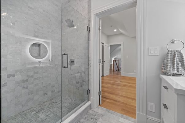 Bathroom, Glass Shower, Interior, Marble Walls, Recessed Lighting, Wood Texture Flooring