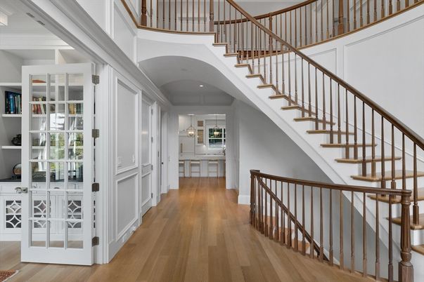 Chandelier, Dining room, Fireplace, Interior, Living room, Pendant Lights, Recessed Lighting, Wood Texture Flooring