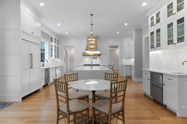 Chandelier, Fireplace, Interior, Kitchen, Pendant Lights, Recessed Lighting, Stainless Steel Appliances, Wood Texture Flooring
