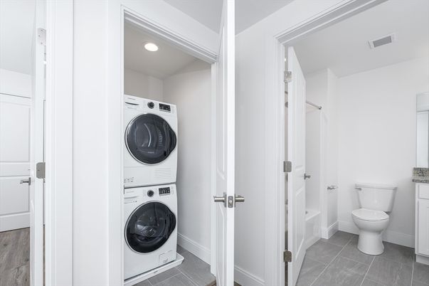 Bathroom, Interior, Recessed Lighting, Utility Closets, Washer, Wood Texture Flooring