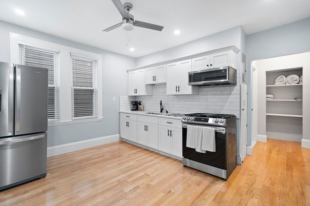 Interior, Kitchen, Recessed Lighting, Stainless Steel Appliances, Wood Texture Flooring