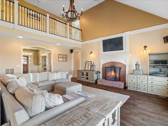Chandelier, Fireplace, Interior, Living room, Recessed Lighting, Wood Texture Flooring
