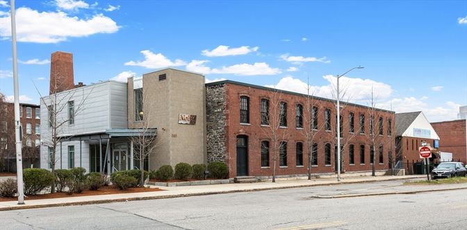 Exterior, Facade, Brick Facade, Condo Building