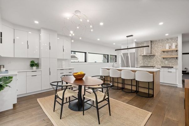 Dining room, Interior, Kitchen, Pendant Lights, Recessed Lighting, Stainless Steel Appliances, Wood Texture Flooring