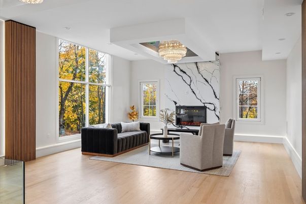 Chandelier, Fireplace, Interior, Living room, Marble Walls, Recessed Lighting, Wood Texture Flooring
