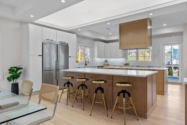 Interior, Kitchen, Marble Walls, Recessed Lighting, Stainless Steel Appliances, Wood Texture Flooring