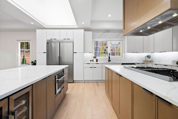 Interior, Kitchen, Marble Walls, Recessed Lighting, Stainless Steel Appliances, Wood Texture Flooring