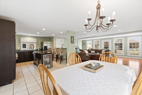 Chandelier, Dining room, Interior, Kitchen, Living room, Recessed Lighting, Stainless Steel Appliances, Wood Texture Flooring