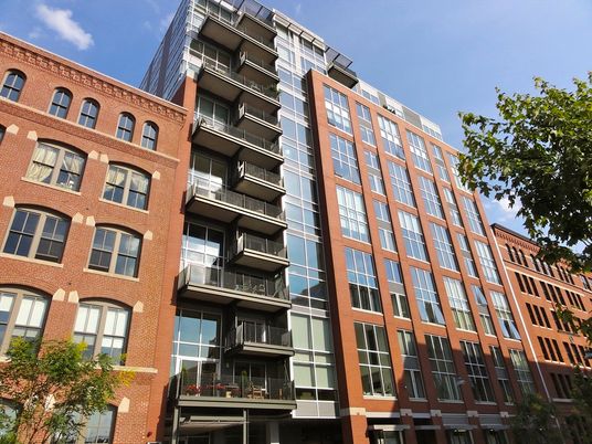 Exterior, Facade, Brick Facade, Condo Building