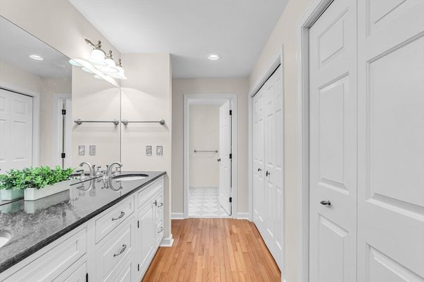 Bathroom, Dual Sink Vanities, Interior, Recessed Lighting, Wood Texture Flooring