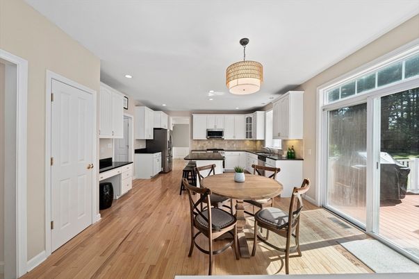 Chandelier, Dining room, Interior, Kitchen, Recessed Lighting, Stainless Steel Appliances, Wood Texture Flooring