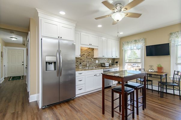 Dining room, Interior, Kitchen, Recessed Lighting, Stainless Steel Appliances, Wood Texture Flooring