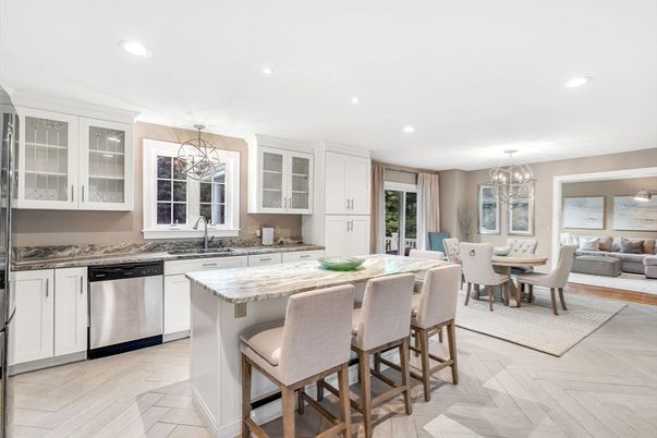 Chandelier, Dining room, Interior, Kitchen, Living room, Pendant Lights, Recessed Lighting, Stainless Steel Appliances, Wood Texture Flooring