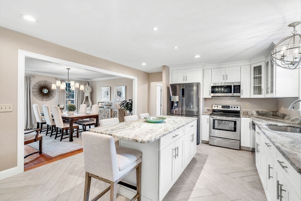 Chandelier, Dining room, Interior, Kitchen, Recessed Lighting, Stainless Steel Appliances, Wood Texture Flooring