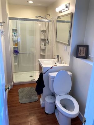 Bathroom, Dual Sink Vanities, Glass Shower, Interior, Recessed Lighting, Wood Texture Flooring