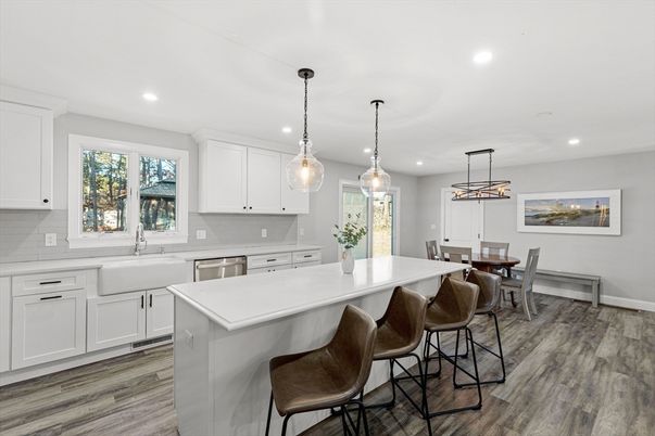 Dining room, Interior, Kitchen, Pendant Lights, Recessed Lighting, Stainless Steel Appliances, Wood Texture Flooring