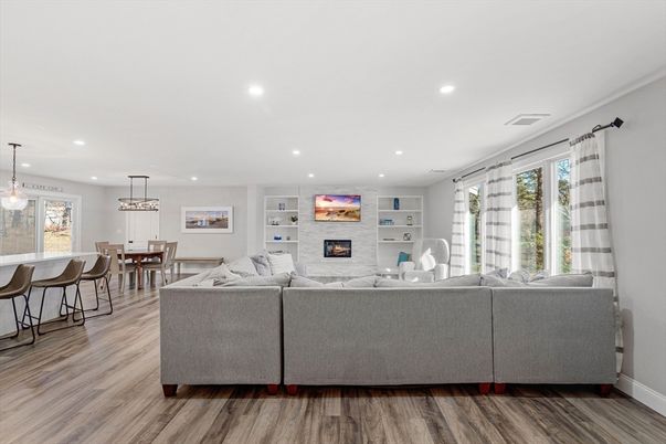 Dining room, Fireplace, Interior, Living room, Pendant Lights, Recessed Lighting, Wood Texture Flooring